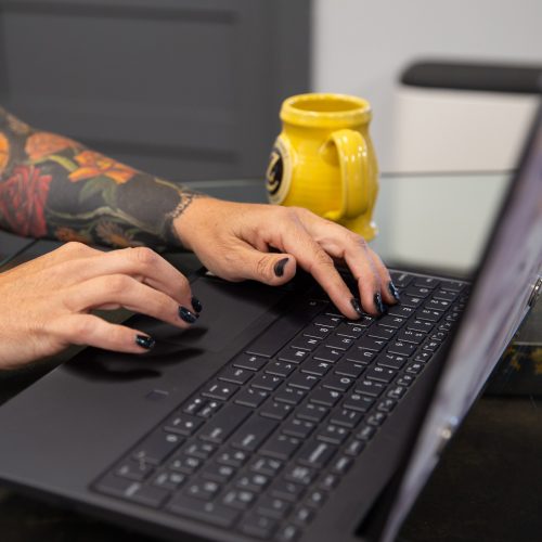 Person typing on a computer